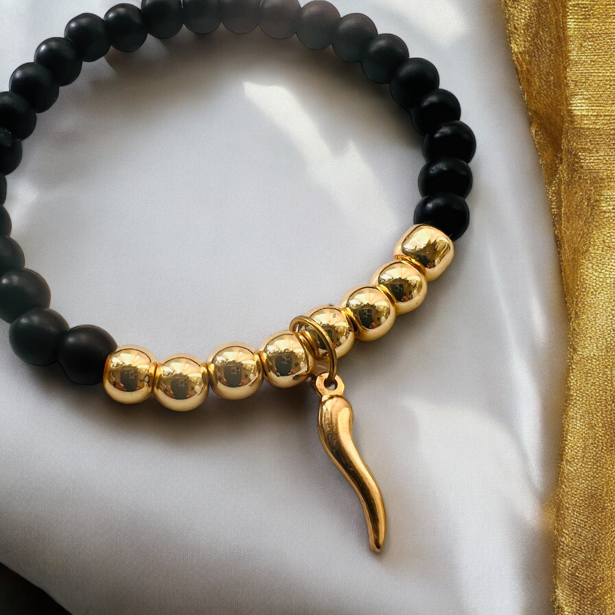 Black CORNICELLO Collection